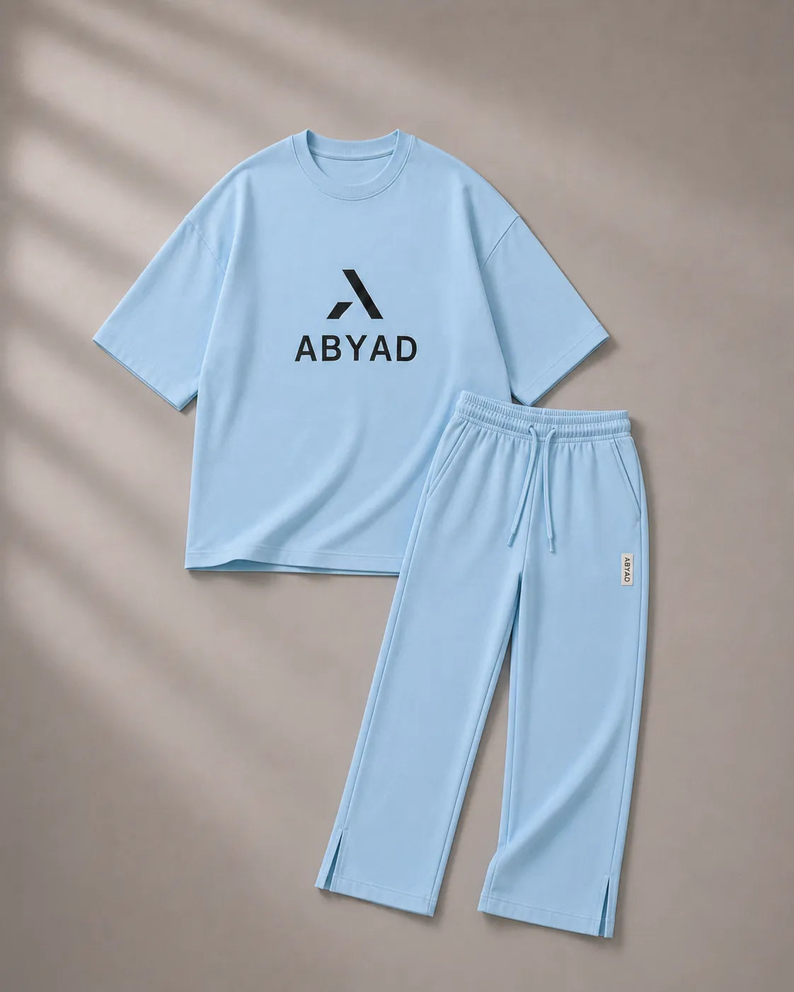 Printed T-Shirt & Split-hem Trousers - A